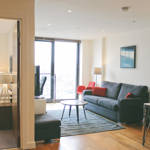 Spacious living area at Homely Serviced Apartments – St. Paul’s featuring comfortable seating and stylish furnishings.