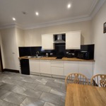 Padley Farm - compact kitchen with appliances and storage units