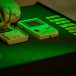 An original GameBoy that has been opened up, on display at The National Videogame Museum