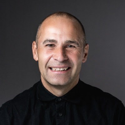 Picture of Rob King against a dark background