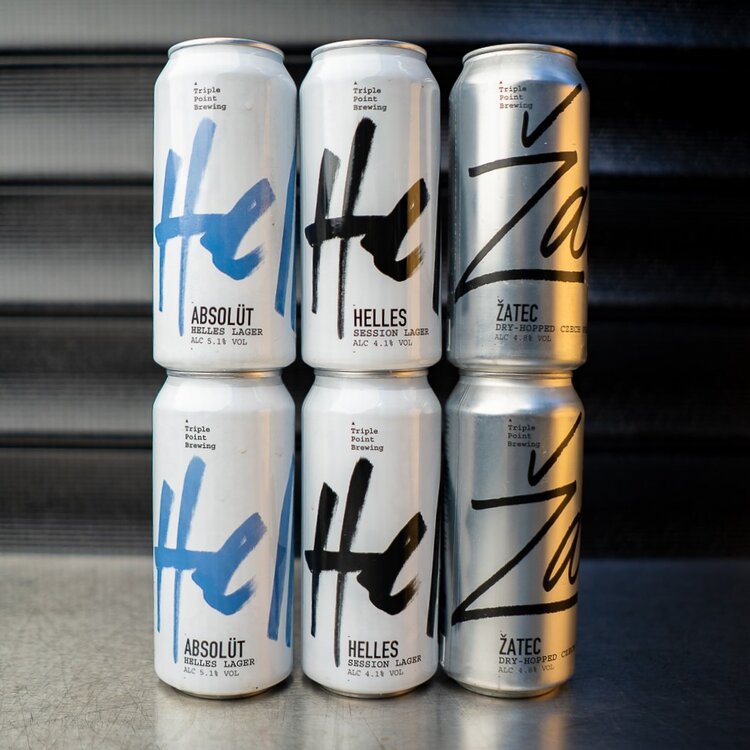 Six beer cans at Triple Point Brewery & Bar