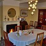 Elegant table set for guests at Wortley Cottage Guest House with fresh linens and tableware.