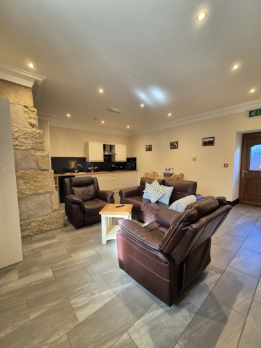Padley Farm - living room with seating area and coffee table.