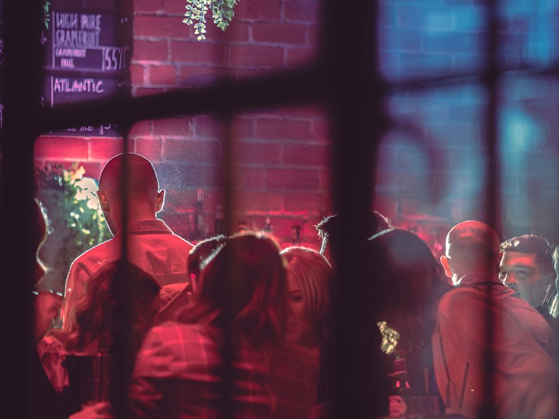 The interior of Saw Grinders Union shot through a window.