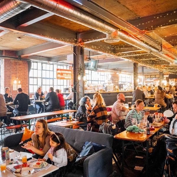 Inside Cutlery Works, filled with customers dining.
