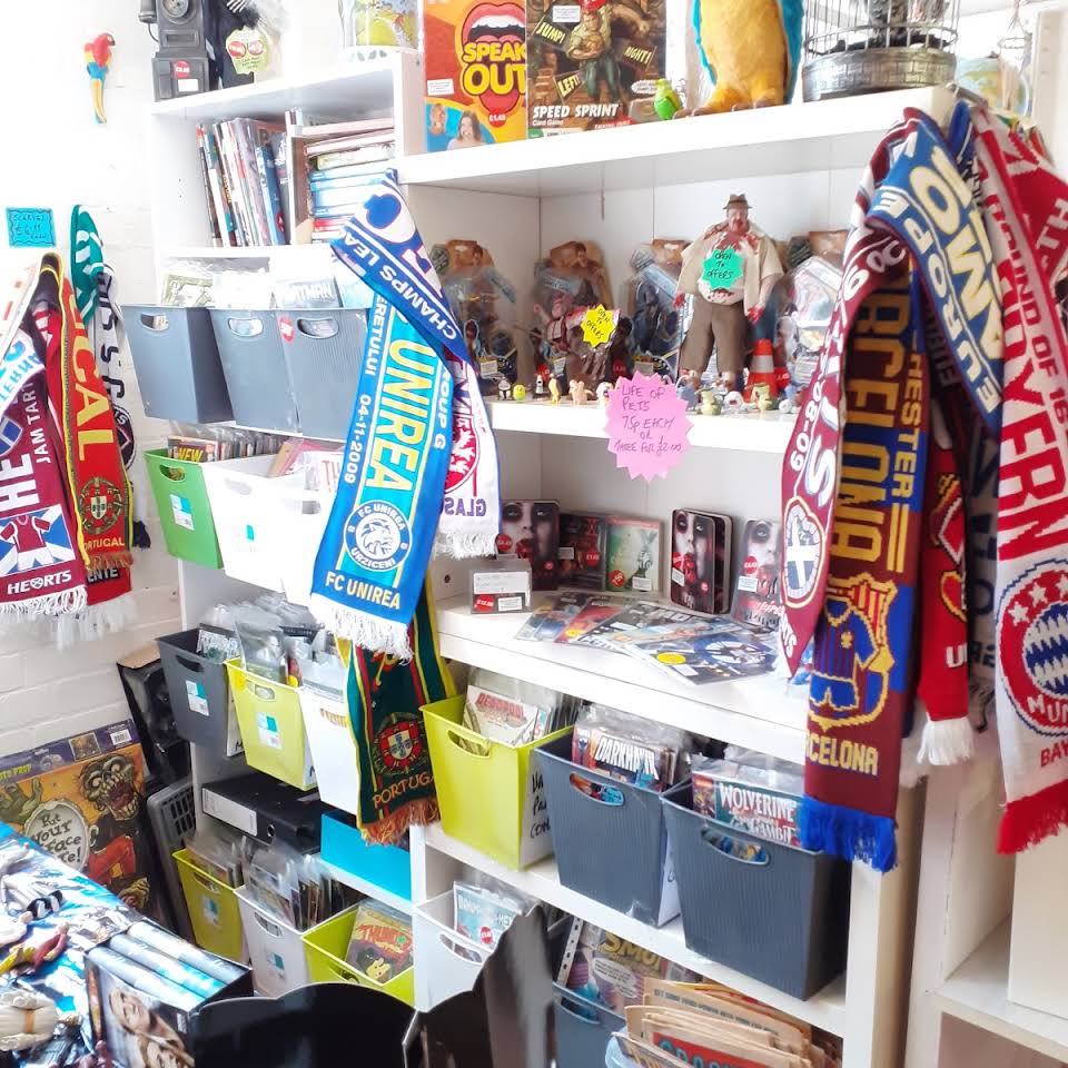 Shelves packed full of things for sale at The Indie Arcade.