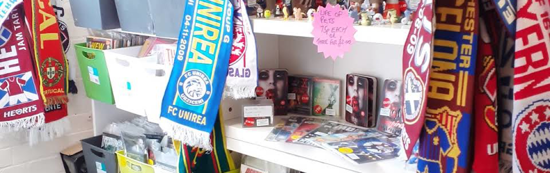 Shelves packed full of things for sale at The Indie Arcade.