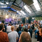 View of live music stage at Peddler Warehouse for Get Together 2023