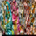 Colourful clothes hanging on a rail.