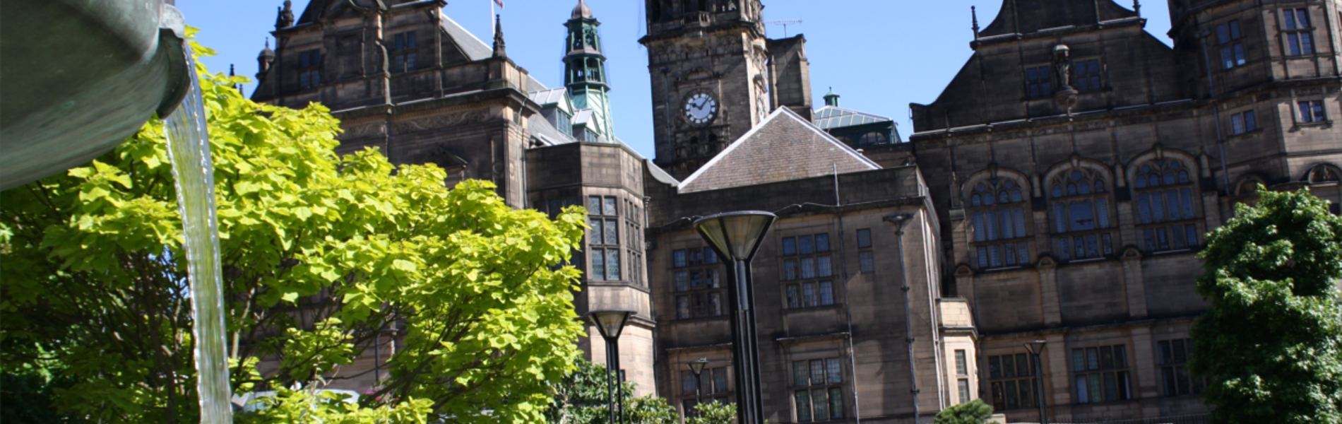Sheffield Town Hall as seen from The Peace Gardens on a sunny day.