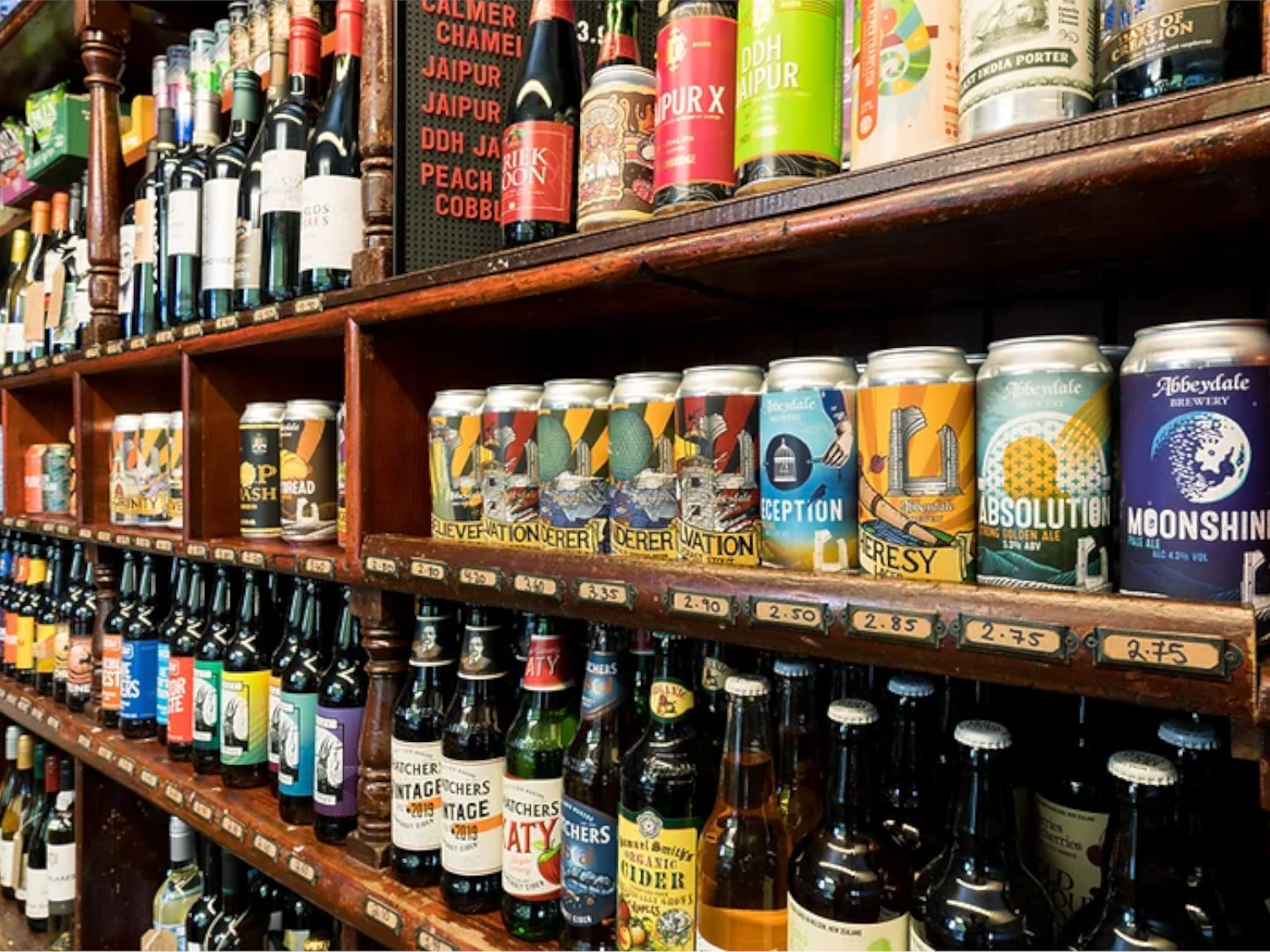 Rows of bottles and cans on shelves at The Green Shop