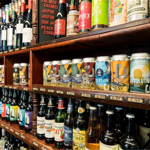Rows of bottles and cans on shelves at The Green Shop