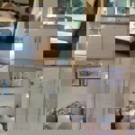 Four interior photos of Wortley Hall Cottages including a modern kitchen, cosy bedroom, stylish bathroom, and comfortable living room.