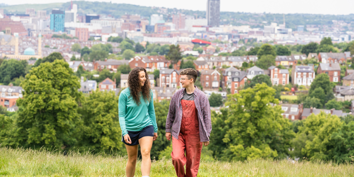 Two people exploring Sheffield'a Green Space At Meersbrook Park.