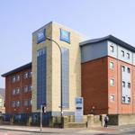 Exterior view of the Ibis Sheffield Arena hotel showing the modern building.