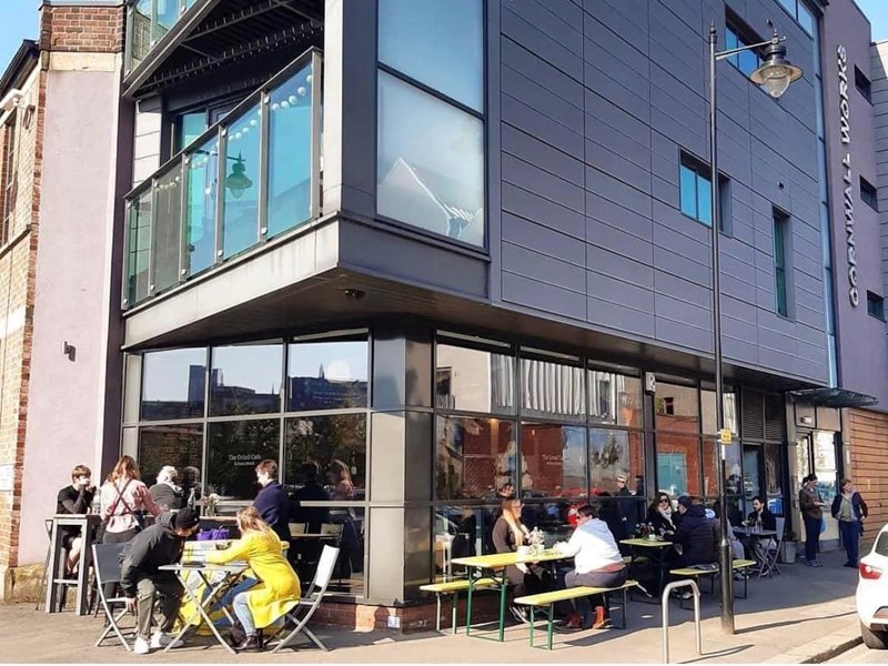 The exterior of The Grind Café.