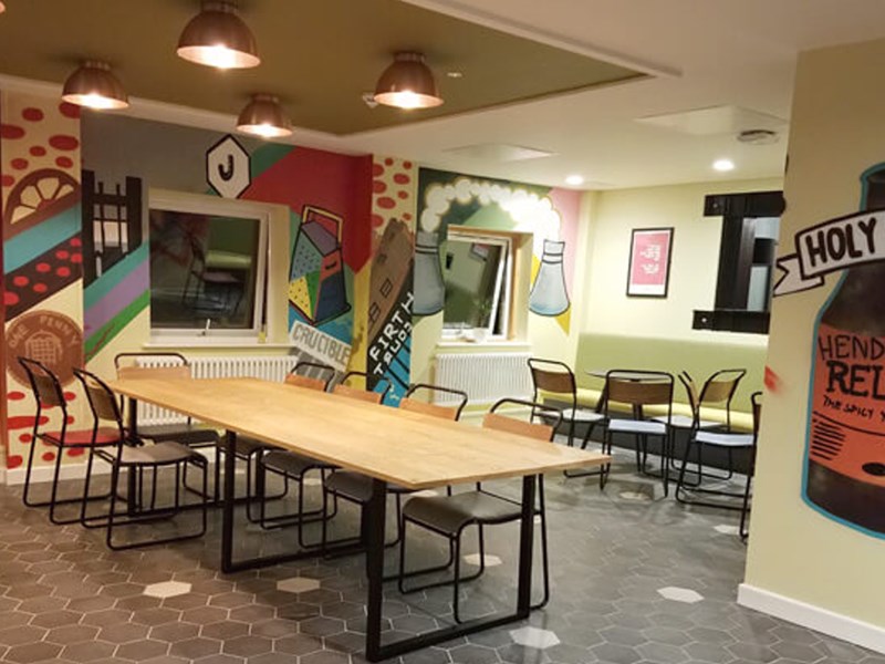 Jonas Court – communal area with seating and open space for residents.