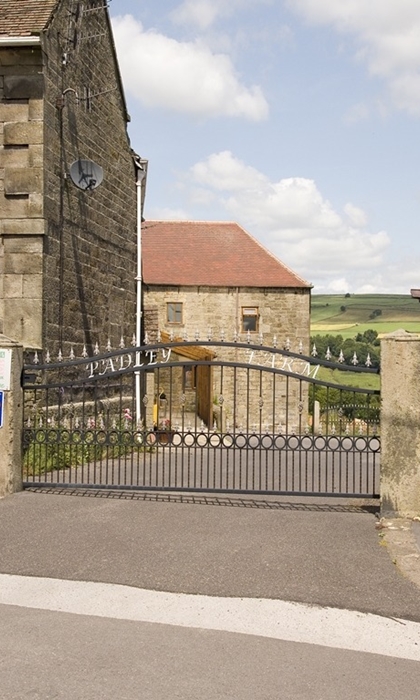 Padley Farm – exterior view with driveway leading to the entrance.