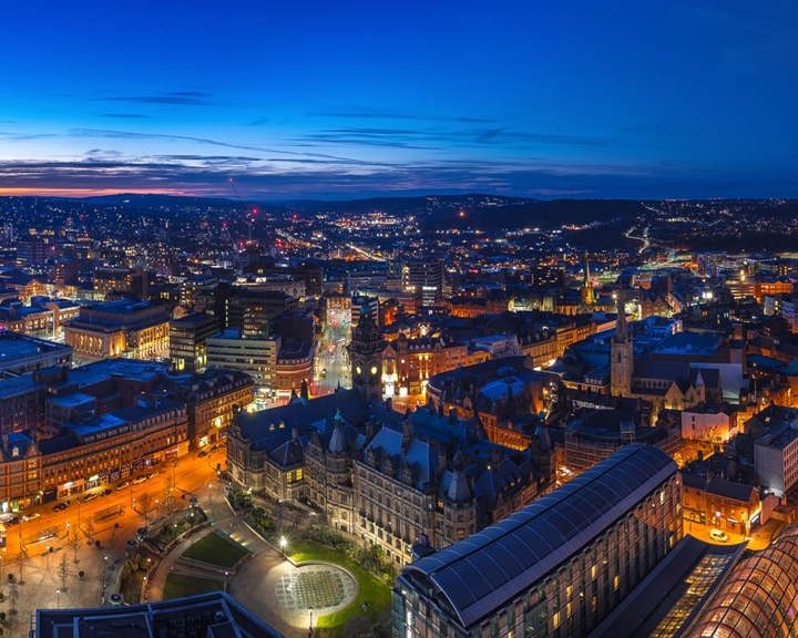 A panorama shot of the Sheffield skyline at night.