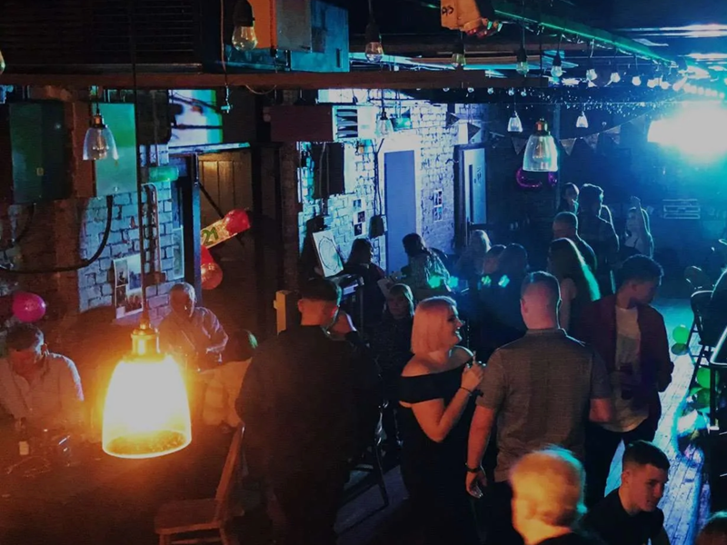 A crowd of people enjoying a night out at Toolmakers Live.