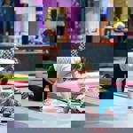 A woman and a small child playing and having fun at Jump Inc.