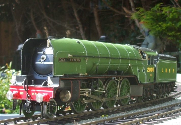 A green locomotive at the Abbeydale Miniature Railway.