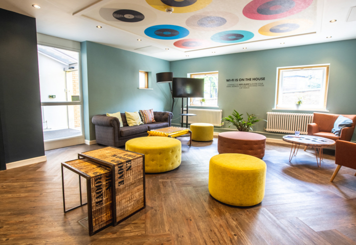 Jonas Court – communal area with seating and open space for residents.