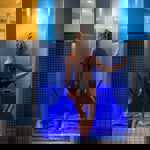 A woman entering a cold water plunge pool at Spa 1877