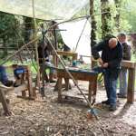 People taking part in a wood craft course at the J.G. Graves Woodland Discovery Centre.