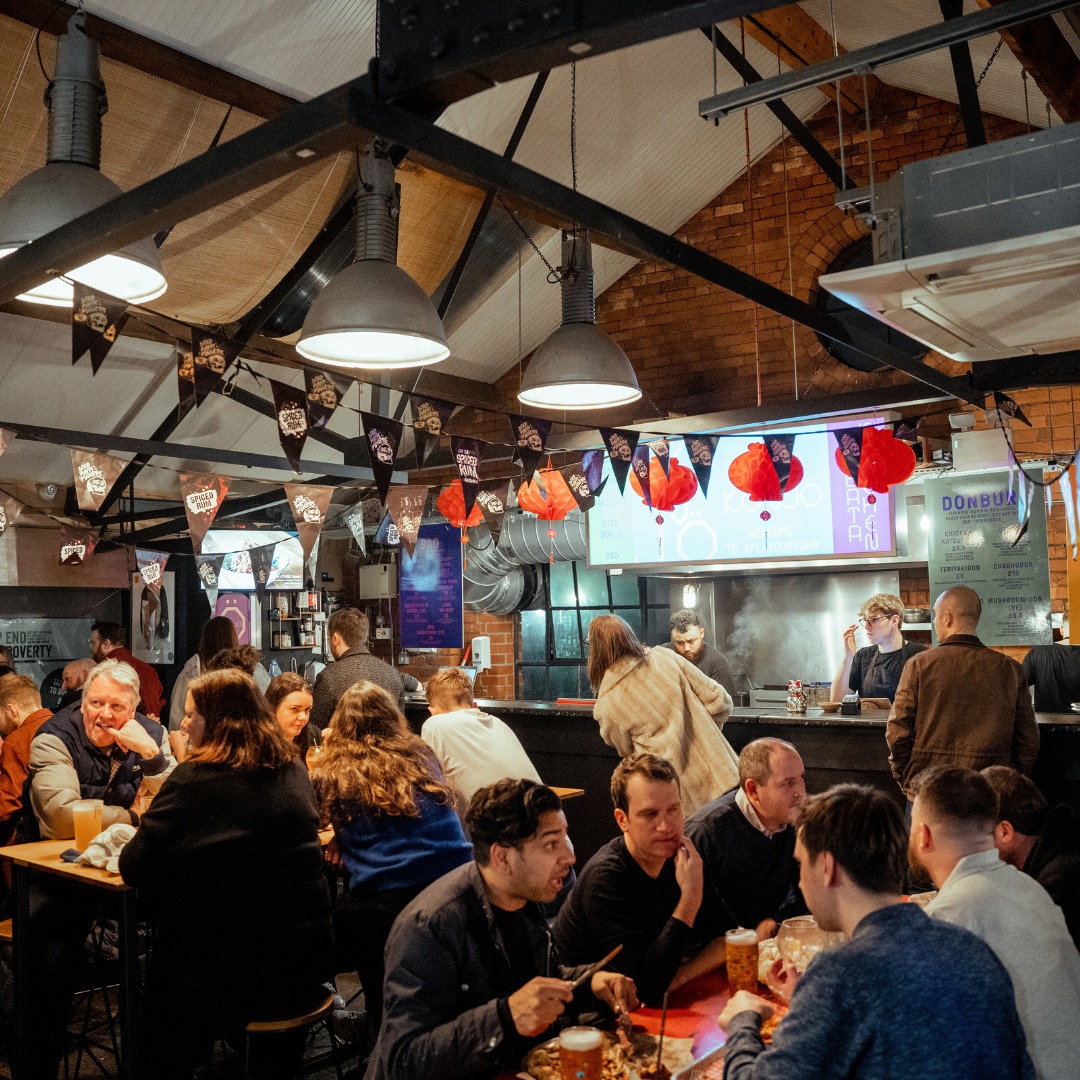 Inside Cutlery Works, filled with customers dining.