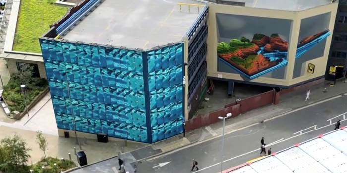 Aerial shot looking down on the building of the NCP car park on Wellington Street in Sheffield where the complete Rivers and Hills mural now adorns it's walls
