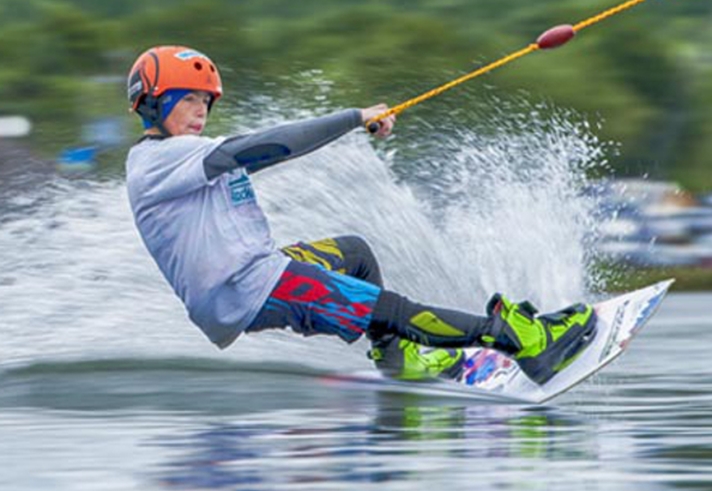A person water skiing on a lake.
