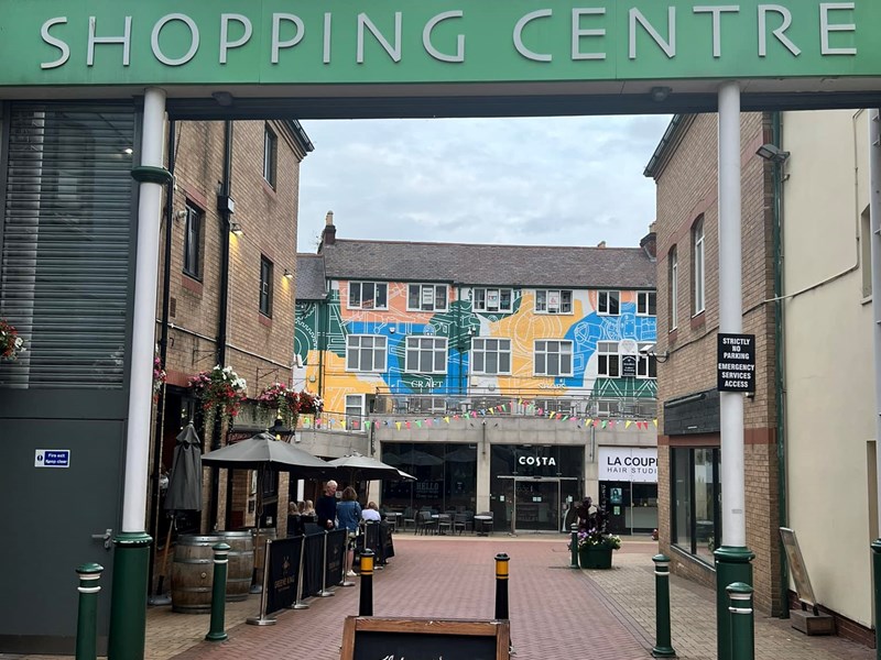 The entrance to Orchard Square.