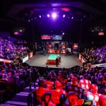 interior of the Crucible theatre showing audiences watching the World Snooker Championship 