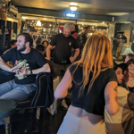 A crowd of people enjoying a night out at The Ecclesall Ale Club.