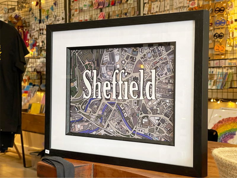 A framed picture of a hand-drawn map of Sheffield at Annie Jude's
